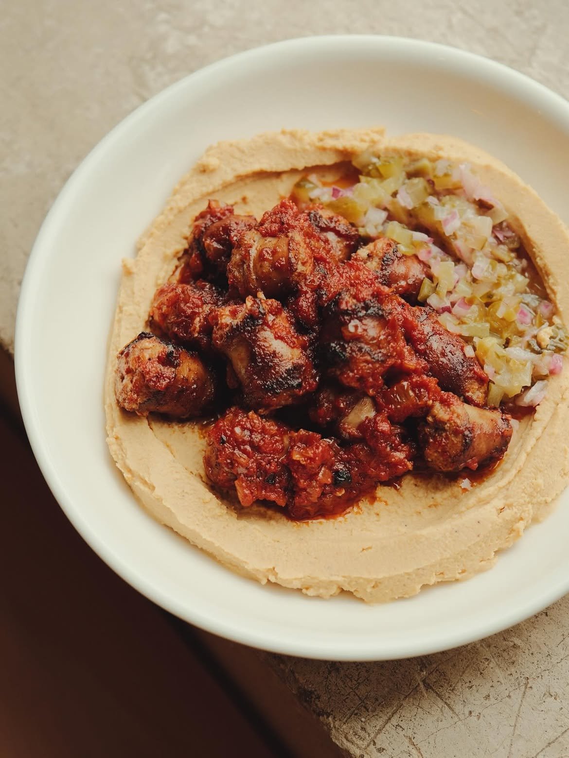 Kupati with lentil purée & jalapeño salsa