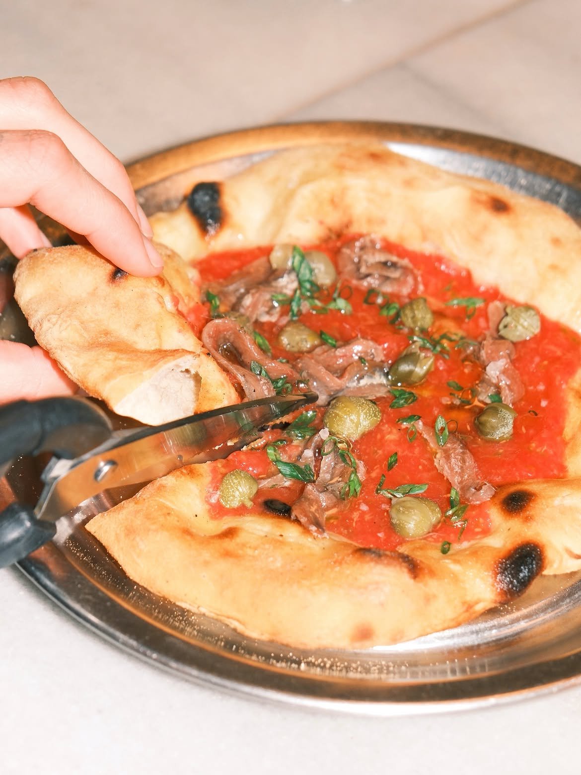 Fatbread with pan con tomate and anchovies