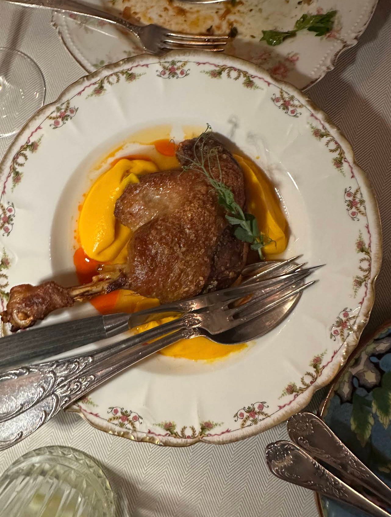Confit of French duck leg with carrot puree